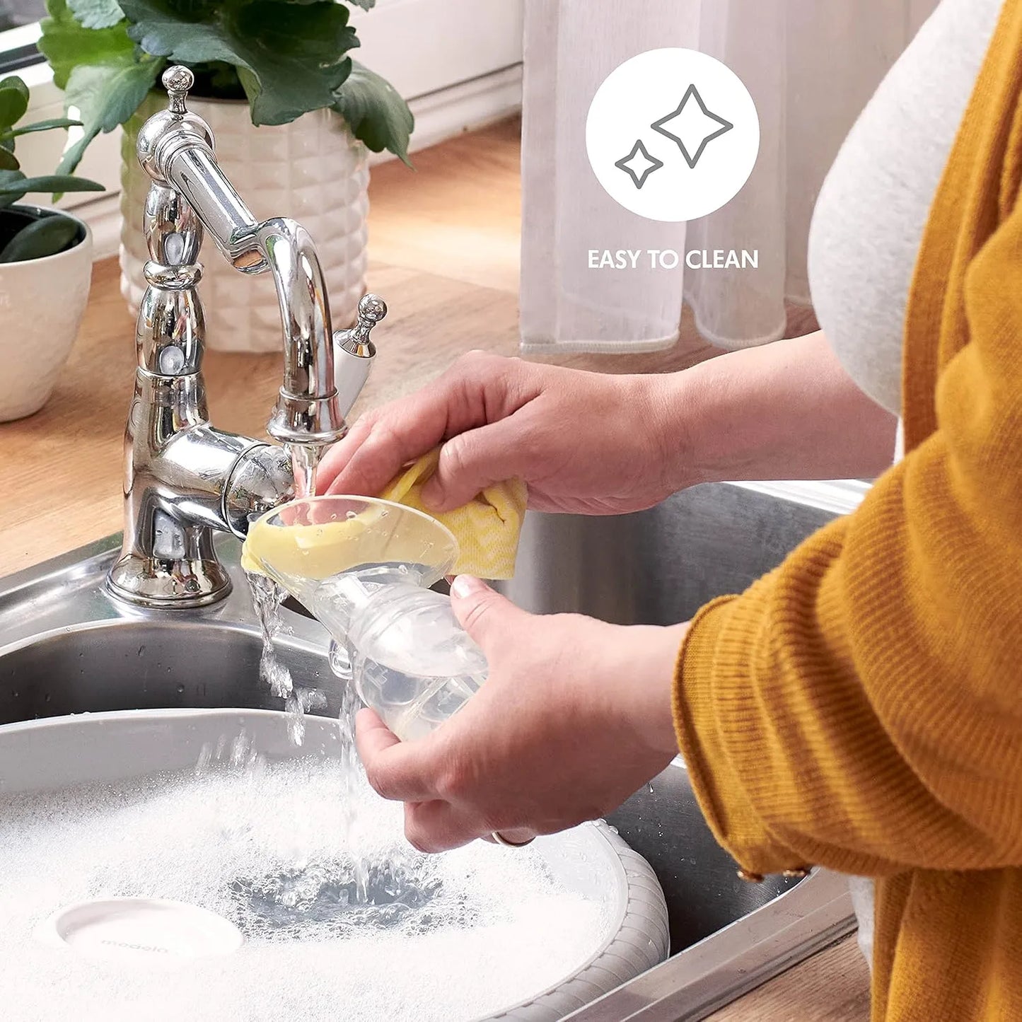 Set compacto y silencioso para extraer y recolectar leche materna fácilmente. Ideal para lactancia en movimiento.
